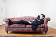 Foto: businessmann auf der couch businessmann auf der couch