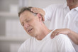 Chiropractic: Chiropractor doing neck adjustment