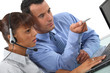 Colleagues in front of computer