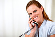 Friendly young woman smiling and speaking