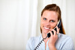 Lovely young woman smiling and speaking