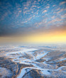 Frosty morning over forest spaces with river