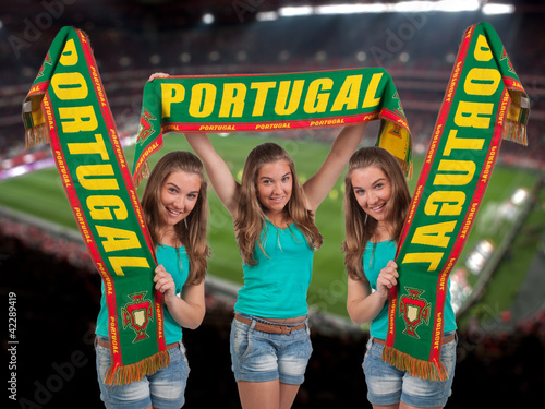 Photo: Soccer fan with the stadium on the back Soccer fan with the stadium on the back