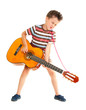 Photo: Little boy plays guitar country style Little boy plays guitar country style