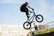 BMX bicycler over ramp