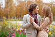 Foto: Romantic couple at fall, having a date Romantic couple at fall, having a date