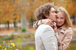 Foto: Romantic couple at fall, having a date Romantic couple at fall, having a date