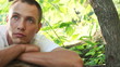 Video: Young man dreaming outdoors Young man dreaming outdoors