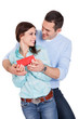 Young man giving present to his girlfriend