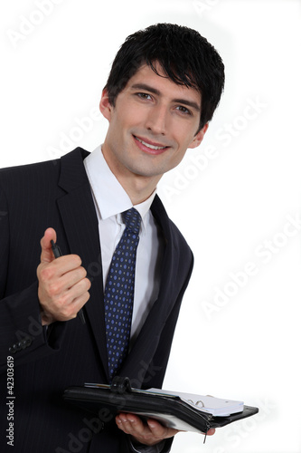 Photo: Businessman with diary Businessman with diary