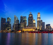 Singapore skyline and river in evening