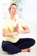 Senior woman doing yoga.