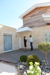 Woman handing house keys