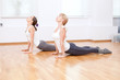 Photo: Women doing yoga exercise at gym Women doing yoga exercise at gym
