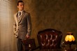 Businessman with a briefcase in retro interior