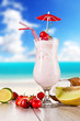 Summer drink with blur beach on background