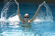 woman trains synchronous swiming