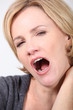 Woman yawning