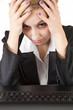suffering from pain - young businesswoman with headache