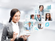 Portrait of businesswoman holding her tablet computer and commun