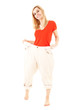 weight loss - happy young woman in too great trousers