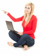 smiling young woman wiith laptop showing something, full length