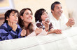 Family watching tv