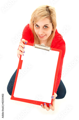 Photo: young woman keeping blank clipboard, high angle view young woman keeping blank clipboard, high angle view