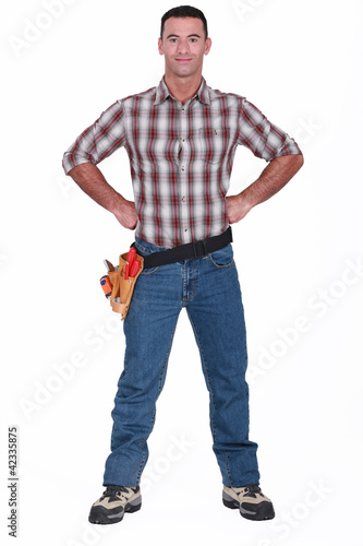 Photo: Artisan posing with hands on hips Artisan posing with hands on hips