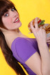 Oblique image of girl with burger