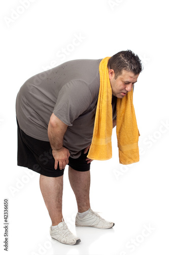 Photo: Fat man playing sport Fat man playing sport