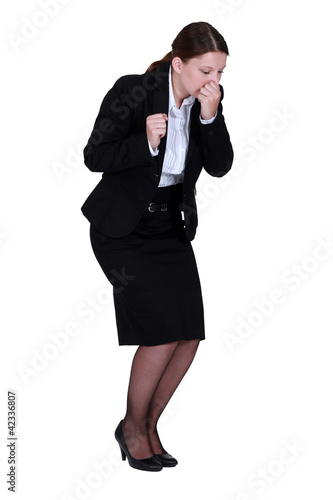 Photo: Businesswoman sneezing Businesswoman sneezing