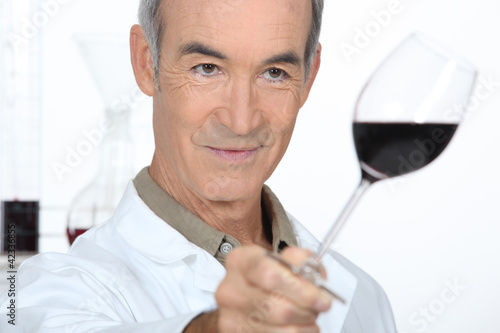 Photo: Man tasting red wine Man tasting red wine