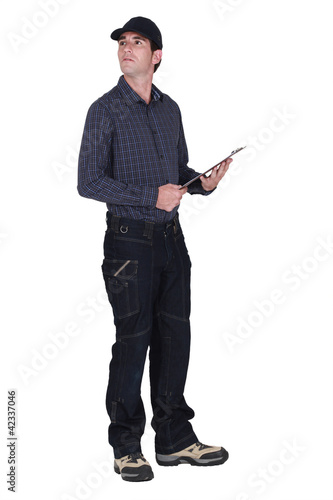 Photo: craftsman taking notes craftsman taking notes