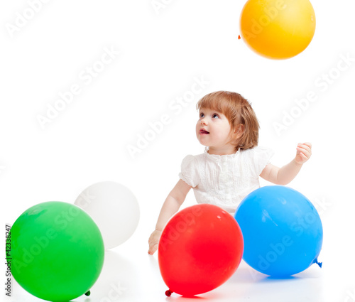Photo: girl with colorful balloons, isolated on white girl with colorful balloons, isolated on white
