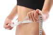 Photo: woman measure her waist belly by metre-stick. woman measure her waist belly by metre-stick.