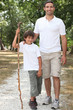 Father and son walking in the countryside