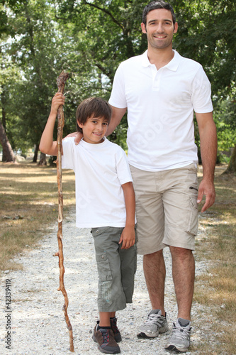 Photo: Father and son walking in the countryside Father and son walking in the countryside