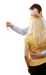 A couple with a key, back-view