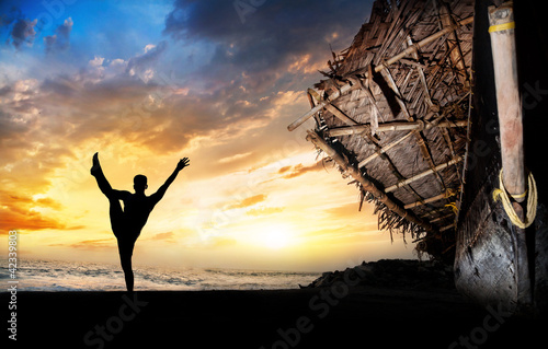 Photo: Yoga silhouette on the beach Yoga silhouette on the beach