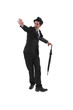 elated man in suit dancing with umbrella
