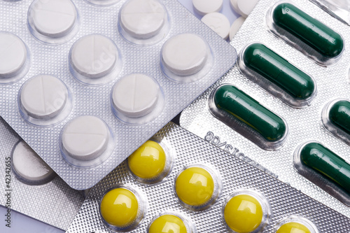 Photo: various pills and capsule texture various pills and capsule texture