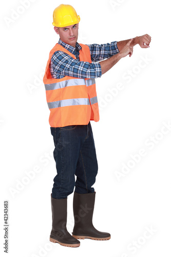 Foto: Foreman keeping time Foreman keeping time