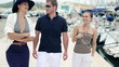 Video: Young rich friends walking and talking in marina Young rich friends walking and talking in marina