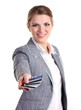 Smiling business woman stretching out hand with plastic cards