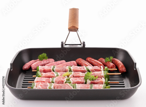 Photo: grill pan with raw meats grill pan with raw meats