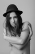 Photo: Black and white fashion portrait of beautiful woman with hat Black and white fashion portrait of beautiful woman with hat
