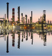 Oil and gas refinery with reflection in water