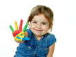 Little girl is proud of her coloured hand