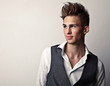 Foto: Elegant young handsome man. Elegant young handsome man.